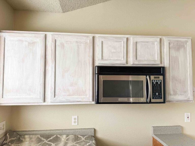 Kitchen cabinets primed with a white primer